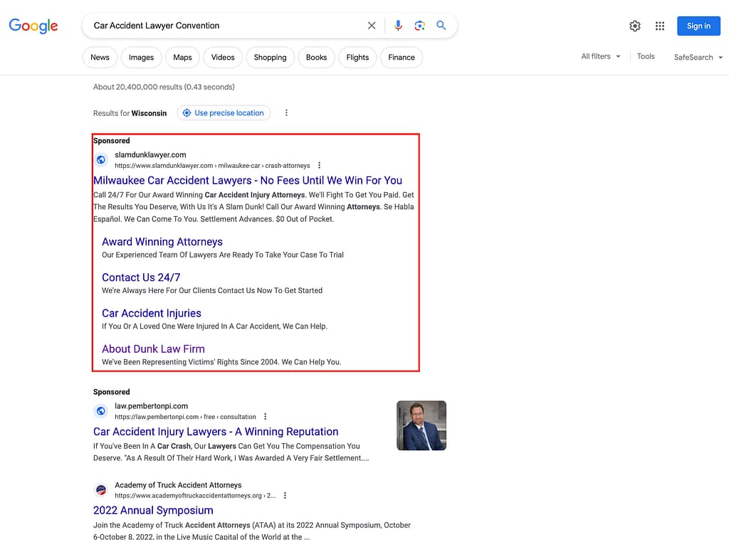 Dunk Law Firm, a Wisconsin based personal injury law firm, has ads showing for irrelevant searches. Pictured is their ad for the search “Car Accident Lawyer Convention”.