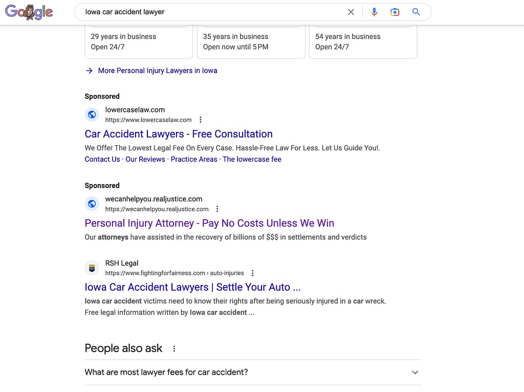 Lowercase, a Florida based personal injury law firm, has ads showing for irrelevant searches. Pictured is their ad for the search "Iowa Car Accident Lawyers".