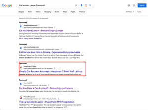 Hauptman, O'Brien, Wolf & Lathrop, a Nebraska based personal injury law firm, has ads showing for irrelevant searches. Pictured is their ad for the search “Car Accident Lawyer Powerpoint”.