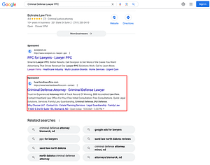 Heartland Law Office, a North Dakota based personal injury law firm, has ads showing for irrelevant searches. Pictured is their ad for the search “Criminal Defense Lawyer PPC”.
