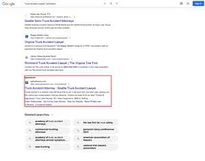 Phillips Law Firm, a Washington based personal injury law firm, has ads showing for irrelevant searches. Pictured is their ad for the search “Truck Accident Lawyer Convention”.