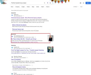 Oswalt Law Group, an Arizona based personal injury law firm, has ads showing for irrelevant searches. Pictured is their ad for the search "File Bar Complaint Injury Lawyer".
