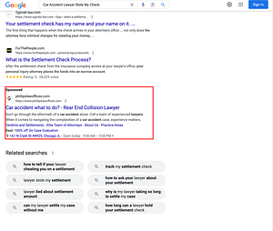 Phillips Law Offices, an Illinois based personal injury law firm, has ads showing for irrelevant searches. Pictured is their ad for the search "Car Accident Lawyer Stole My Check".
