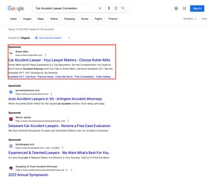 Rutter Mills, a Virginia based personal injury law firm, has ads showing for irrelevant searches. Pictured is their ad for the search "Car Accident Lawyer Convention".