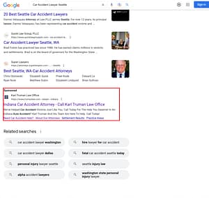 Karl Truman, a Kentucky based personal injury law firm, has ads showing for irrelevant searches. Pictured is their ad for the search "Car Accident Lawyer Seattle".