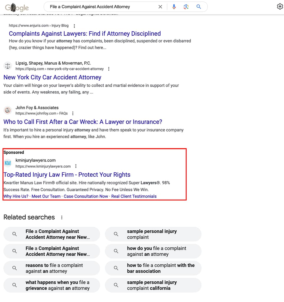 Kwartler Manus, a New Jersey based personal injury law firm, has ads showing for irrelevant searches. Pictured is their ad for the search "File a Complaint Against Accident Attorney".